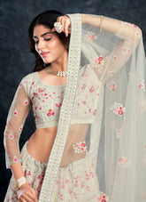 Popular Looking Partywear Lehenga Choli in White Colour